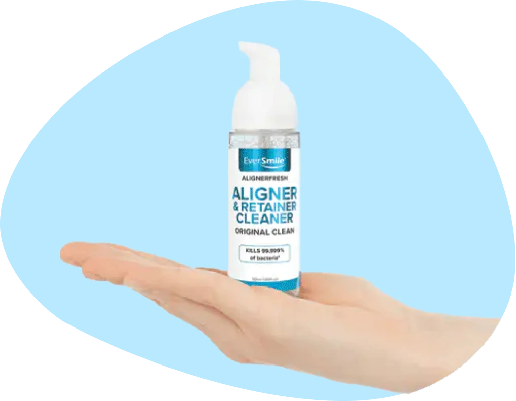 hand with aligner cleaner on it